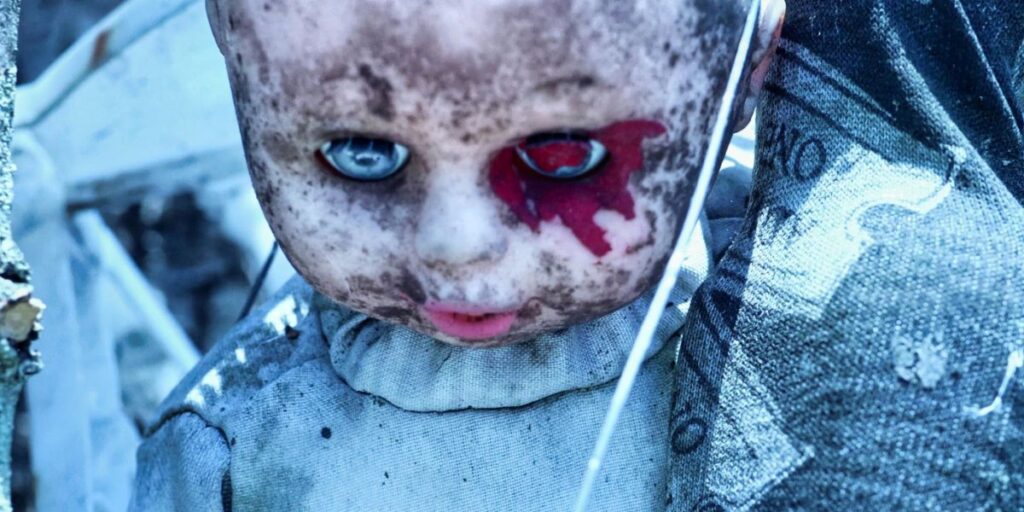 Creepy bloody-eyed doll in Xochimilco, Mexico.