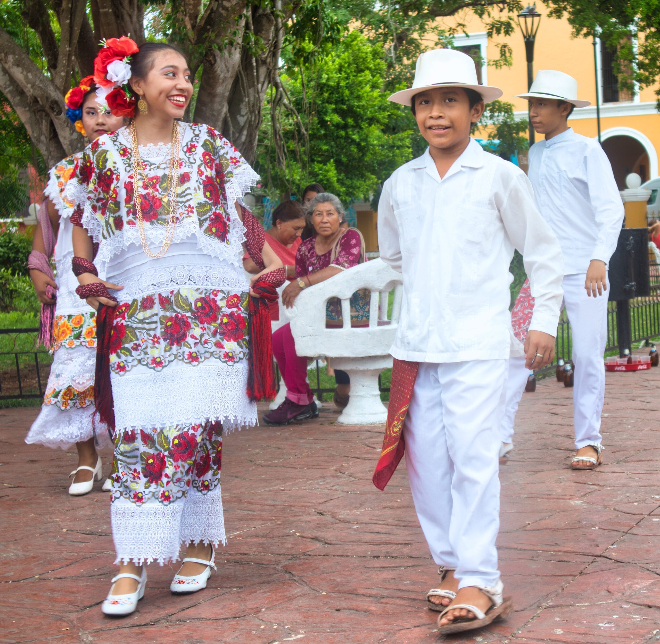 Dancers of Maya ancestry perform la jarana in traditional attire at Parque Francisco Cantón Rosado Valladolid, Yucatán, Mexico.