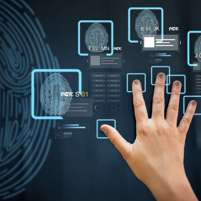 Dark blue digital screen showing a person's hand and five spread fingers with fingerprints somewhat similar to efirma fingerprints taken in Mexico.